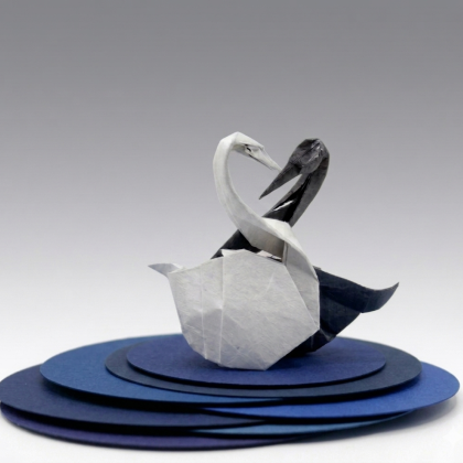 Two swans from a sheet of paper